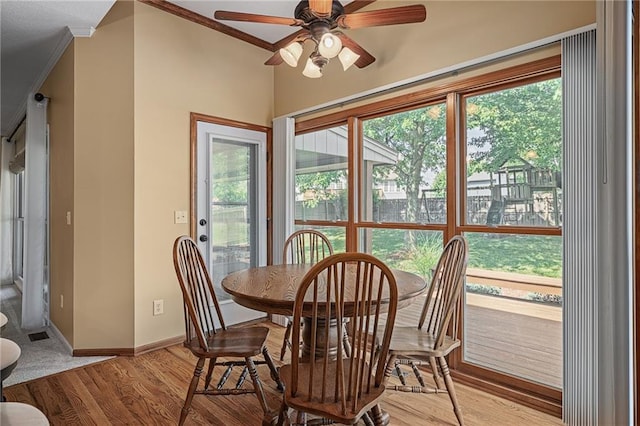 508 Ambersham Dr, Lees Summit, MO 64081 - dining space with ornamental molding, ceiling fan, and wood finished floors