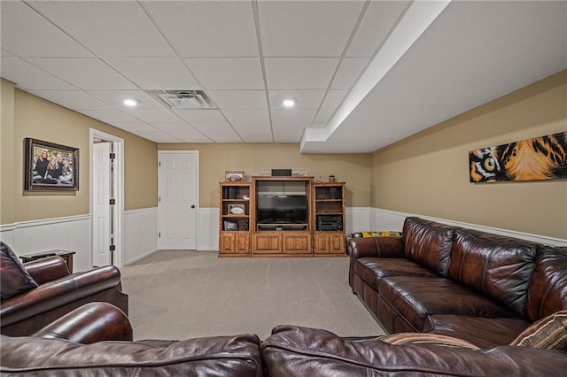 508 Ambersham Dr, Lees Summit, MO 64081 - carpeted living area featuring a wainscoted wall, a drop ceiling, and recessed lighting