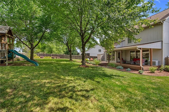 508 Ambersham Dr, Lees Summit, MO 64081 - view of yard with a wooden deck and a playground
