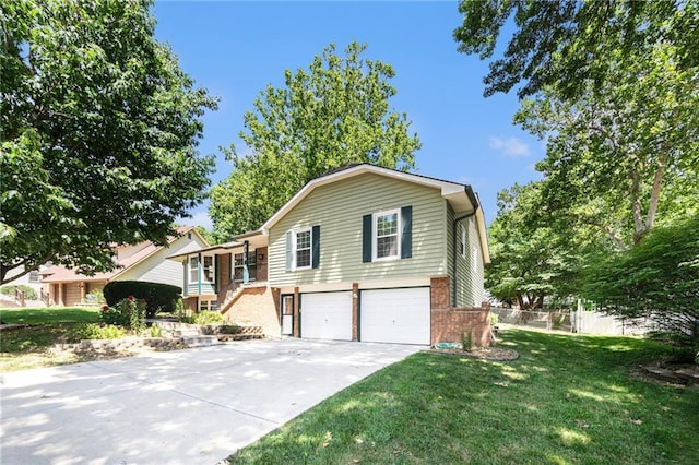 6319 Acuff St, Shawnee, KS 66216 - view of front facade with brick siding, concrete driveway, an attached garage, and stairs