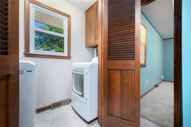 6319 Acuff St, Shawnee, KS 66216 - laundry room featuring cabinet space and baseboards