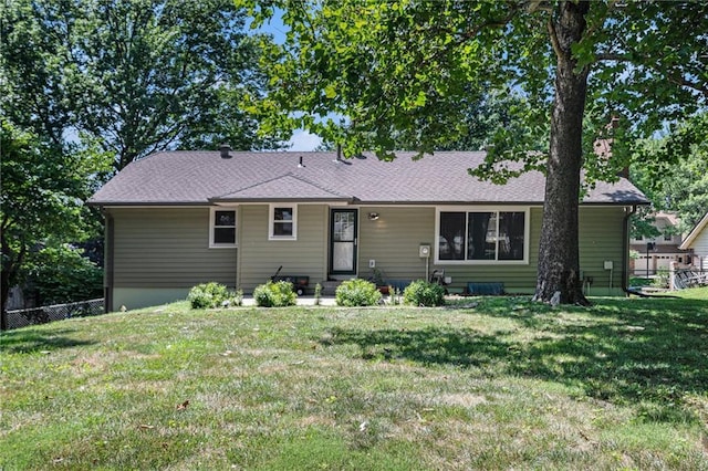 6319 Acuff St, Shawnee, KS 66216 - back of property featuring a shingled roof