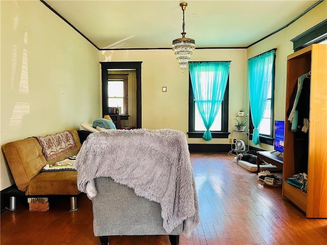 817 S 16th St, Saint Joseph, MO 64501 - bedroom featuring hardwood / wood-style floors and ornamental molding