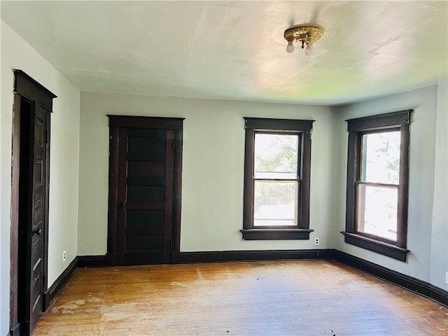 817 S 16th St, Saint Joseph, MO 64501 - spare room with healthy amount of natural light and hardwood / wood-style floors
