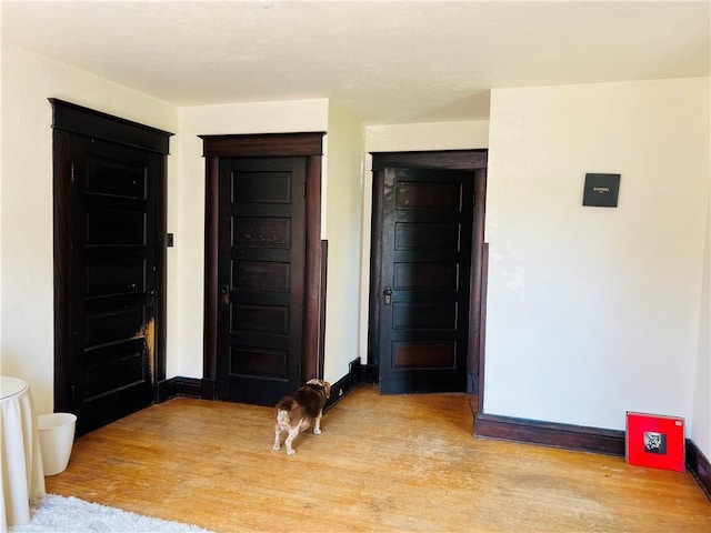 817 S 16th St, Saint Joseph, MO 64501 - entrance foyer with light wood-style floors and baseboards
