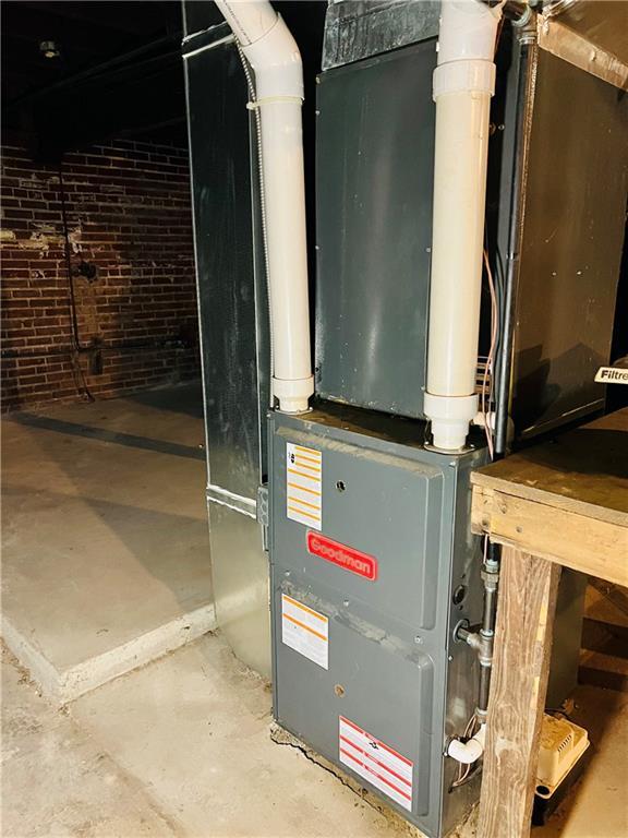 817 S 16th St, Saint Joseph, MO 64501 - utility room with heating unit