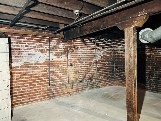 817 S 16th St, Saint Joseph, MO 64501 - unfinished below grade area featuring brick wall
