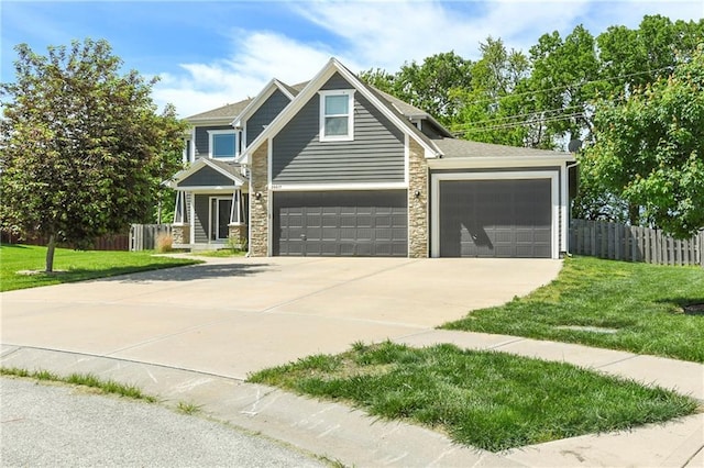 28617 W 162nd Ter, Gardner, KS 66030 - craftsman inspired home with stone siding, driveway, and an attached garage