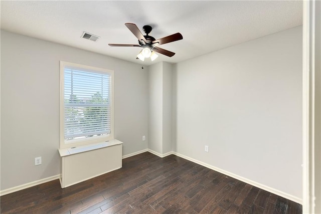 28617 W 162nd Ter, Gardner, KS 66030 - unfurnished room with dark wood-style flooring and a ceiling fan