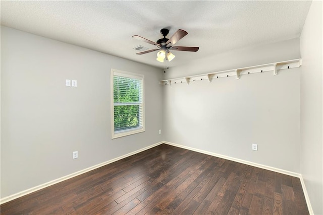 28617 W 162nd Ter, Gardner, KS 66030 - empty room featuring dark wood-style flooring, a ceiling fan, and a textured ceiling