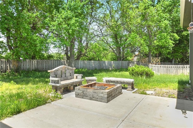 28617 W 162nd Ter, Gardner, KS 66030 - fenced backyard featuring an outdoor fire pit and a patio