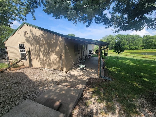 19823 74th St, Mclouth, KS 66054 - view of side of home with a patio area
