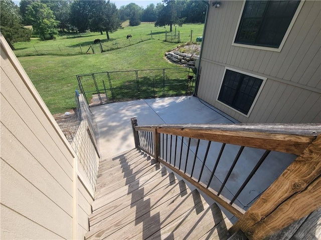 19823 74th St, Mclouth, KS 66054 - wooden deck with a patio area and a rural view