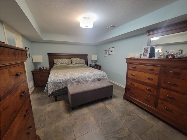 19823 74th St, Mclouth, KS 66054 - bedroom featuring baseboards and a tray ceiling