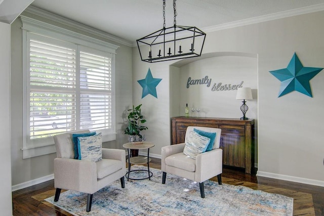 16324 S Locust St, Olathe, KS 66062 - living area with wood finished floors, crown molding, and a chandelier