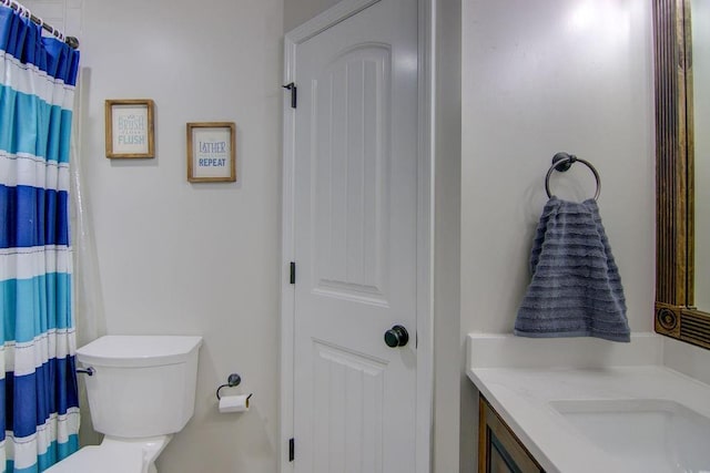 16324 S Locust St, Olathe, KS 66062 - bathroom featuring vanity and a shower with curtain