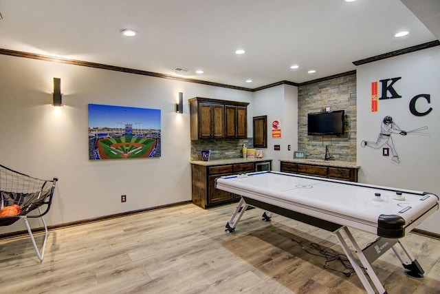 16324 S Locust St, Olathe, KS 66062 - game room with ornamental molding, light wood-style flooring, and recessed lighting
