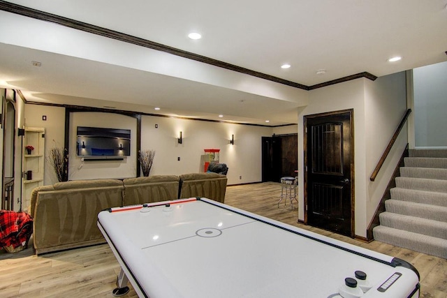 16324 S Locust St, Olathe, KS 66062 - playroom featuring crown molding, light wood-style floors, and recessed lighting