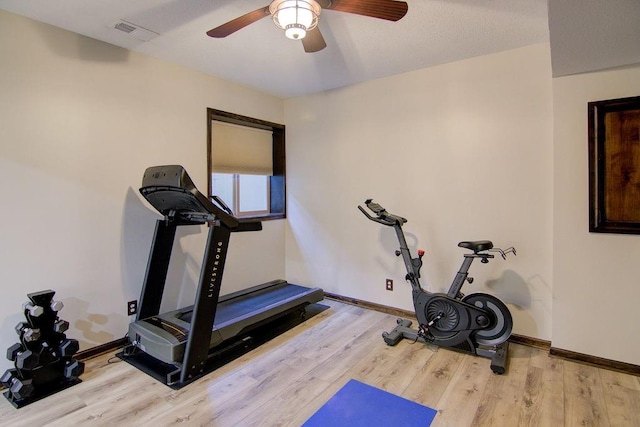 16324 S Locust St, Olathe, KS 66062 - workout area featuring wood finished floors and ceiling fan