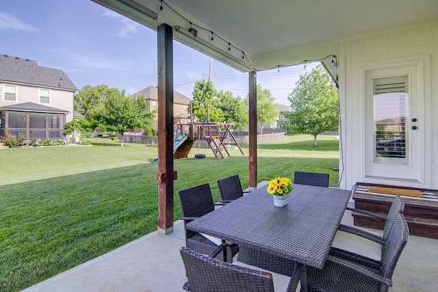 16324 S Locust St, Olathe, KS 66062 - view of patio / terrace with a playground and outdoor dining space