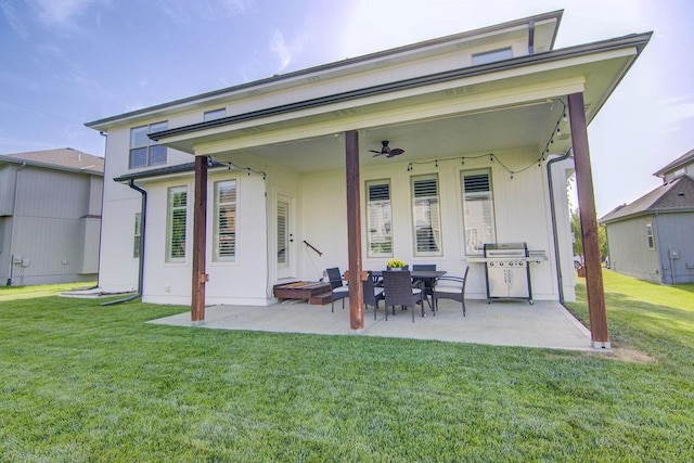 16324 S Locust St, Olathe, KS 66062 - back of property featuring a patio, a yard, and a ceiling fan