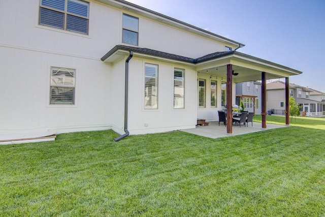 16324 S Locust St, Olathe, KS 66062 - back of property with a patio and a yard
