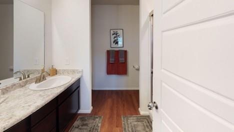 550 W Fountain St, Gardner, KS 66030 - bathroom with vanity and wood finished floors