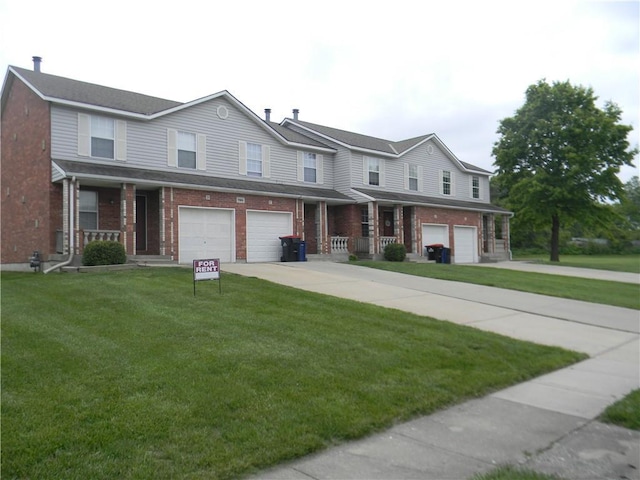 725 SE 10th St, Lees Summit, MO 64081 - traditional-style house with covered porch, a garage, concrete driveway, and a front yard