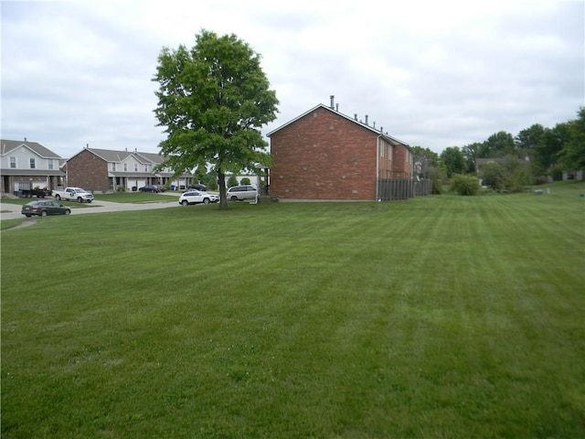 725 SE 10th St, Lees Summit, MO 64081 - view of green lawn with a residential view