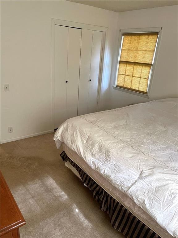 177 1150th St, Humboldt, KS 66748 - carpeted bedroom featuring a closet and baseboards