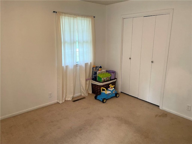 177 1150th St, Humboldt, KS 66748 - unfurnished bedroom with carpet floors and a closet