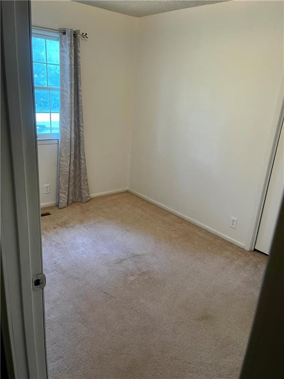 177 1150th St, Humboldt, KS 66748 - carpeted empty room featuring baseboards