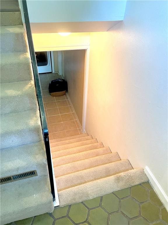 177 1150th St, Humboldt, KS 66748 - stairway featuring tile patterned flooring