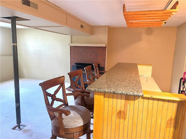 177 1150th St, Humboldt, KS 66748 - carpeted dining room featuring a bar