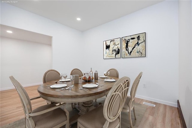308 W Pine St, Cherokee, KS 66724 - dining space featuring light wood-style floors and recessed lighting