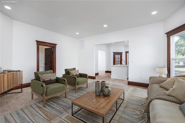 308 W Pine St, Cherokee, KS 66724 - living room with recessed lighting and light wood-style flooring