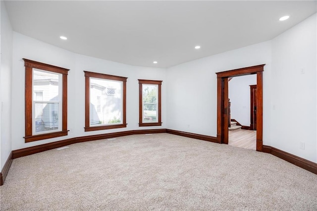 308 W Pine St, Cherokee, KS 66724 - carpeted empty room featuring recessed lighting