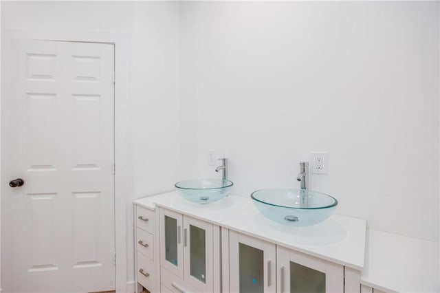 308 W Pine St, Cherokee, KS 66724 - bathroom featuring double vanity