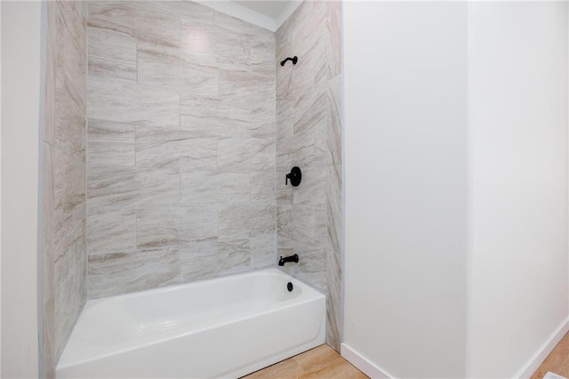 308 W Pine St, Cherokee, KS 66724 - bathroom with shower / tub combination and wood finished floors