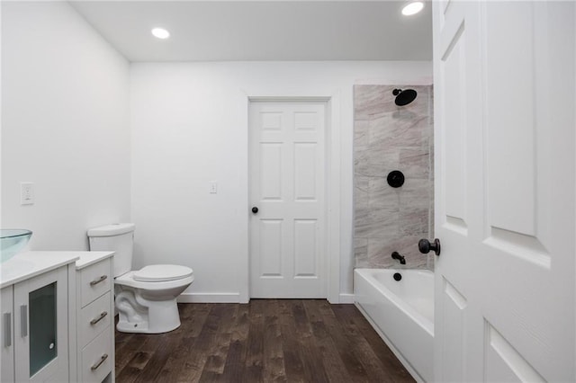 308 W Pine St, Cherokee, KS 66724 - bathroom featuring vanity, wood finished floors, bathing tub / shower combination, and recessed lighting