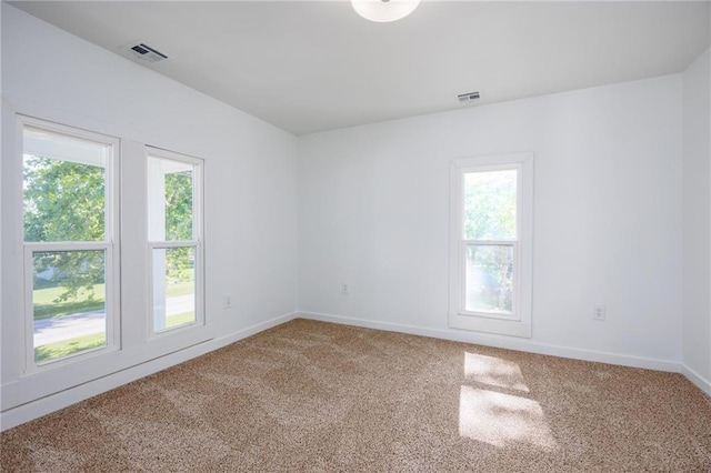308 W Pine St, Cherokee, KS 66724 - carpeted spare room with healthy amount of natural light