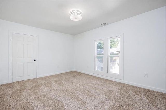 308 W Pine St, Cherokee, KS 66724 - carpeted empty room with baseboards