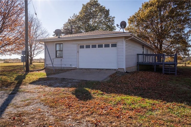 2334 N 100th Rd, Wellsville, KS 66092 - view of side of property with a wooden deck and an attached garage
