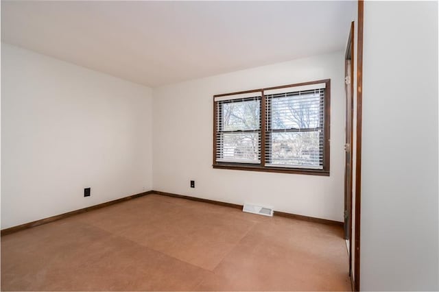 2334 N 100th Rd, Wellsville, KS 66092 - spare room featuring baseboards and light colored carpet