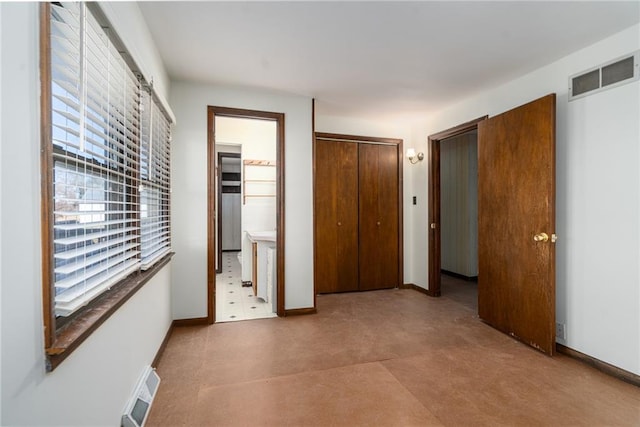 2334 N 100th Rd, Wellsville, KS 66092 - unfurnished bedroom with a closet and ensuite bathroom
