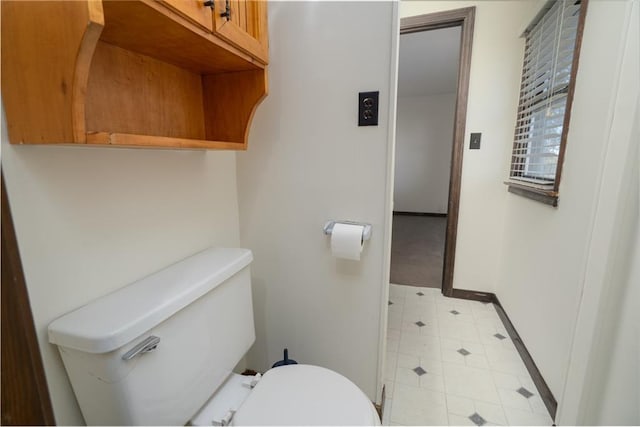 2334 N 100th Rd, Wellsville, KS 66092 - bathroom with toilet and baseboards