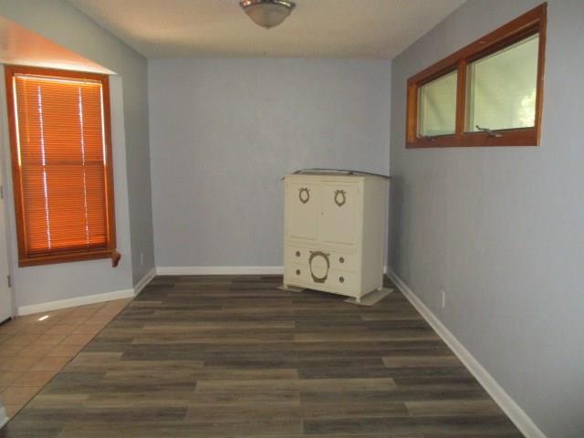 interior space featuring dark wood-type flooring