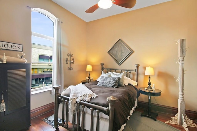 bedroom featuring ceiling fan and hardwood / wood-style floors