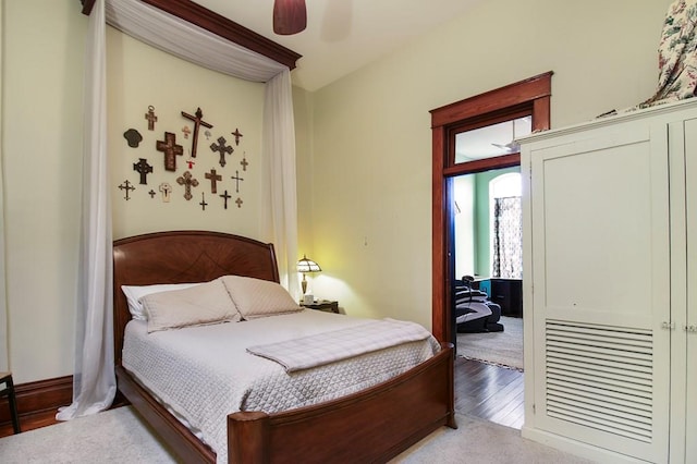 bedroom featuring ceiling fan and carpet floors