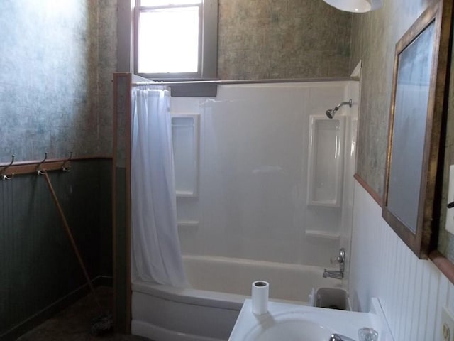 bathroom with shower / bathtub combination with curtain